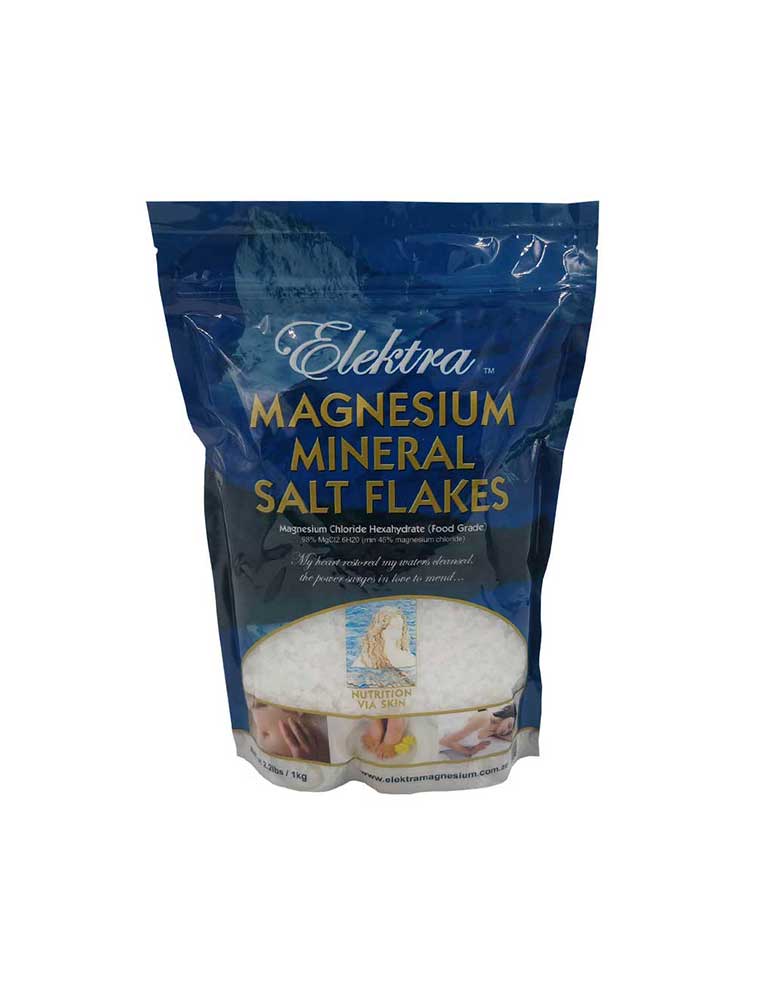 A package of Elektra Magnesium Mineral Salt Flakes, showing the product name and some decorative images of salt crystals and a sunset.