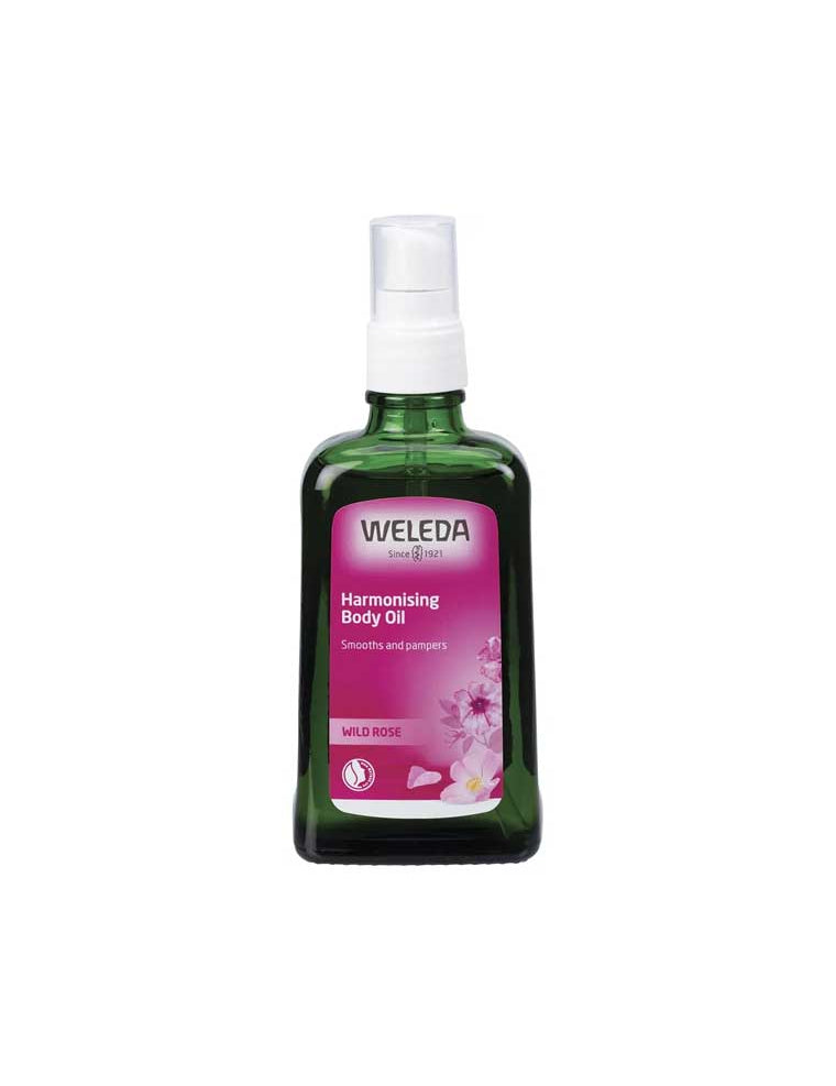 Weleda Harmonising Body Oil Wild Rose in a green bottle with a delicate Damask Rose scent for all skin types.