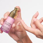 Woman applying The Jojoba Company Neck and Decolletage Lifting Concentrate