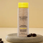 The Jojoba Company Jojoba Bean Natural Exfoliant surrounded by jojoba beans