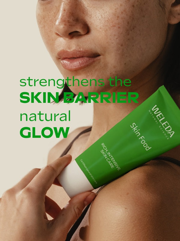 Model applying Weleda Skin Food 100 Years Limited Edition