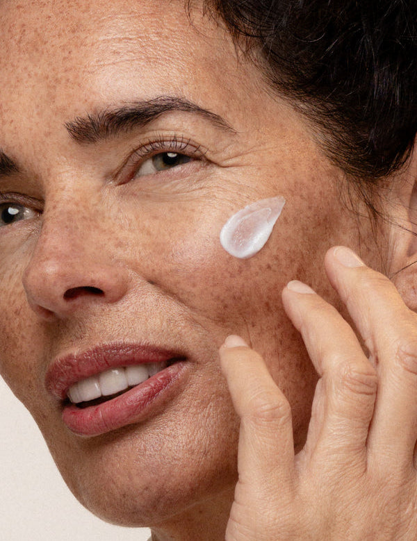Model applying Antipodes Jasmine Flower Menopause Facial Cream
