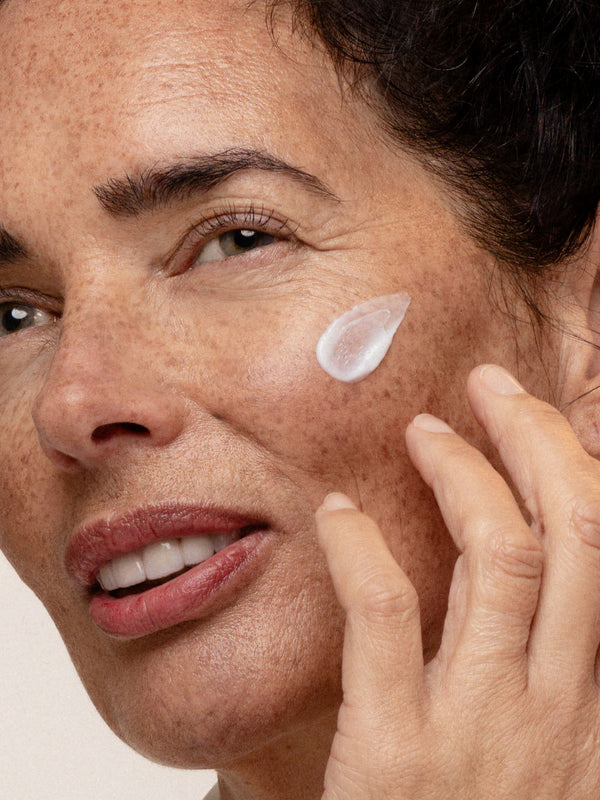 Model applying Antipodes Jasmine Flower Menopause Facial Cream