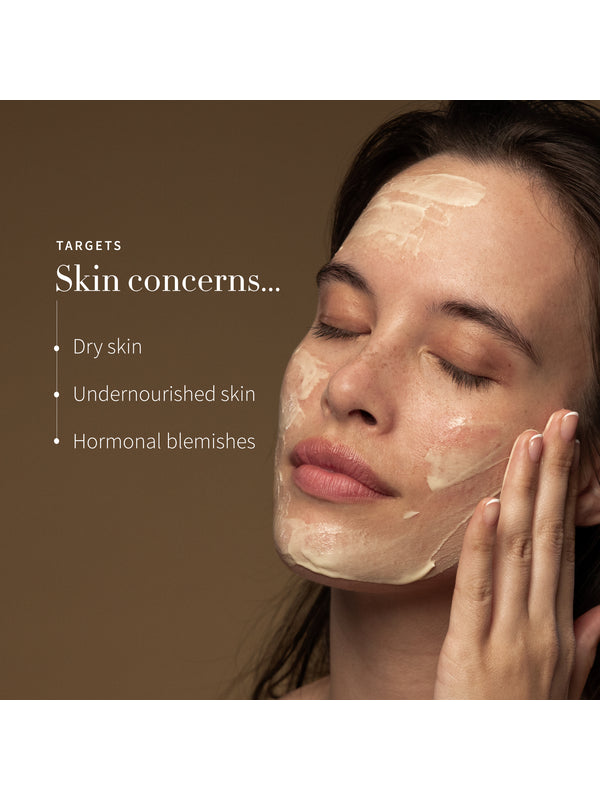 Model applying Antipodes Aura Manuka Honey Mask with skin concerns listed