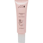 Pink tube of Vitamin C Serum by 100% Pure on a white background
