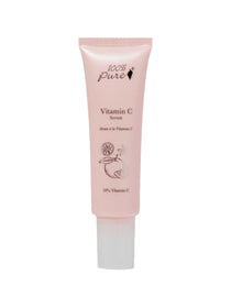 Pink tube of Vitamin C Serum by 100% Pure on a white background