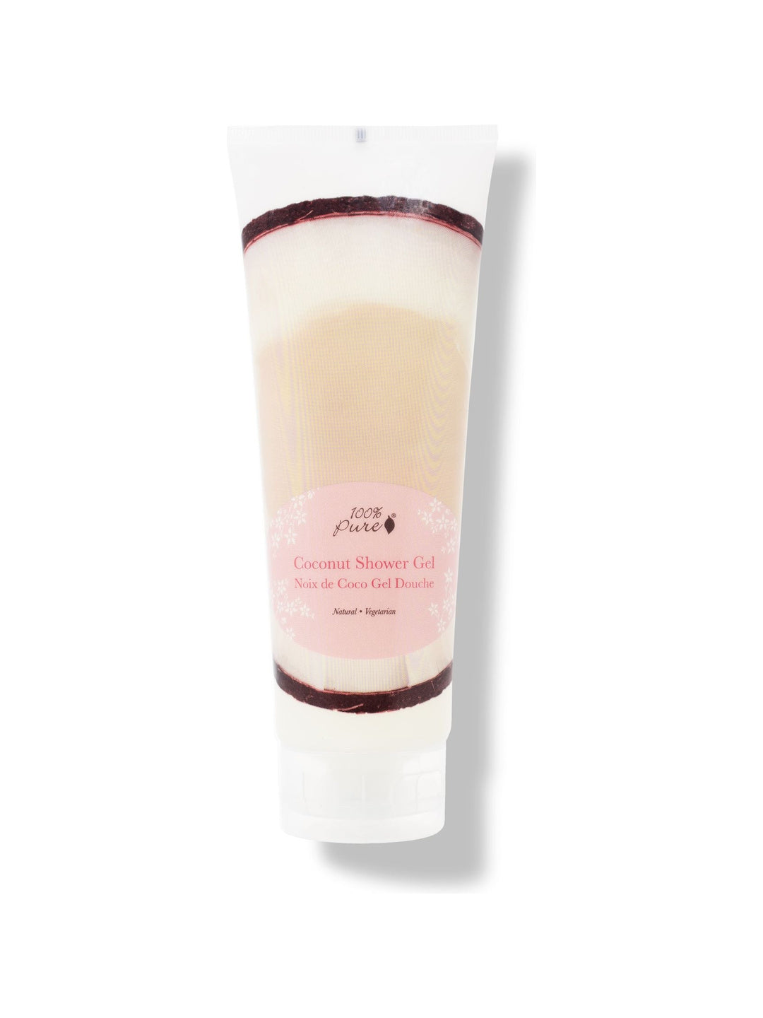 A white 100% Pure Coconut Shower Gel tube stands on a translucent flip-top cap. A pale pink oval label appears over a photograph of white coconut flesh and dark brown shell.