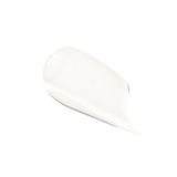 A white swatch of 100% Pure Dark Spot Remover forms a smooth, glossy smear on white. It is rounded and thick at one end, tapering to a fine point at the lower right.