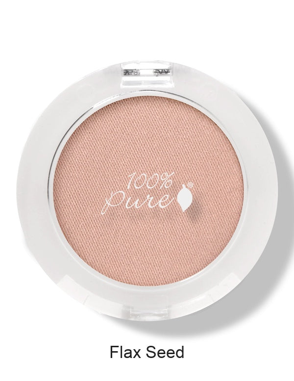 100% Pure Fruit Pigmented Eye Shadow in Flax Seed, showing the pressed powder in its compact on white, with the shade name Flax Seed printed below.