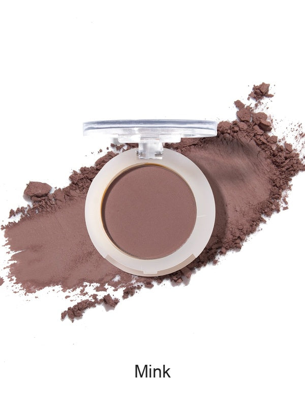 100% Pure Fruit Pigmented Eye Shadow in Mink, showing an open compact beside a sweep of matching loose powder on white, with the shade name Mink printed below.