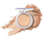 100% Pure Fruit Pigmented Eye Shadow in Star Bright, showing an open compact beside a sweep of matching loose powder on white, with the shade name Star Bright printed below.