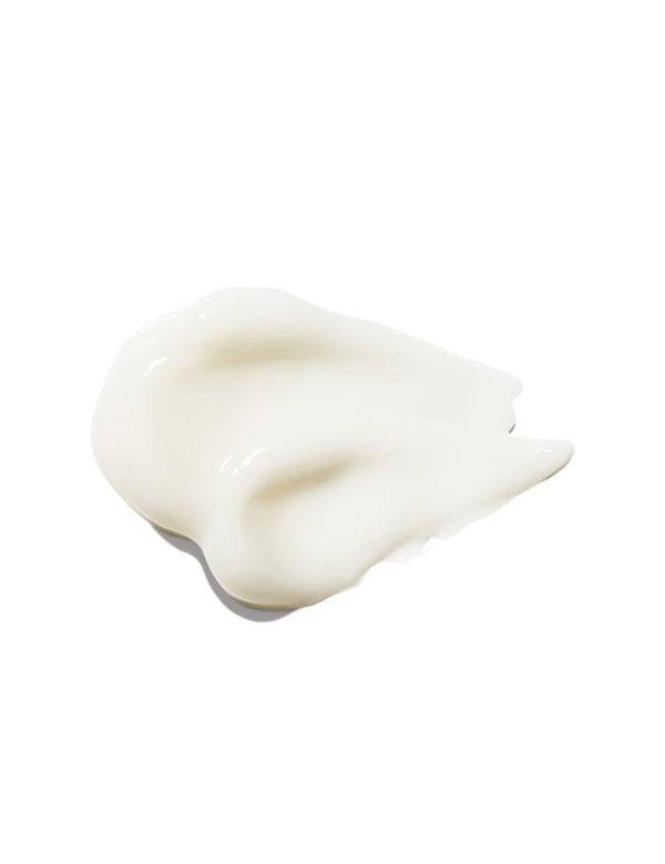 A thick ivory swatch of 100% Pure Super Fruit Oil Nourishing Eye Cream, with glossy highlights, soft folded ridges and a short tapered edge.