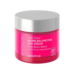 A pink 50g jar of Andalou 1000 Roses Biome Balancing Day Cream for sensitive skin with a silver lid, featuring postbiotic ferment and rose-biotic blend to support the skin barrier and provide daily moisture.