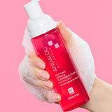 Andalou Sensitive 1000 Roses Gentle Cleansing Foam pump bottle held in hand