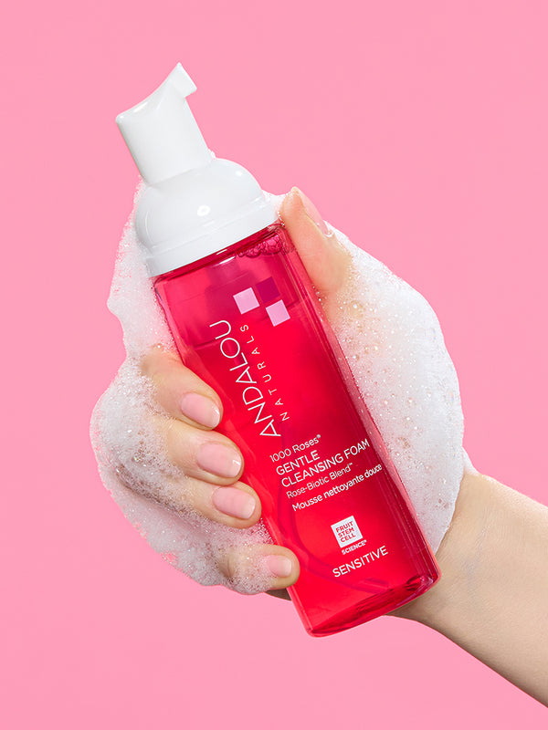 Andalou Sensitive 1000 Roses Gentle Cleansing Foam pump bottle held in hand