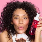 Model using Andalou Sensitive 1000 Roses Gentle Cleansing Foam