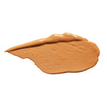 A smooth, oval swatch of medium tan 100% Pure Fruit Pigmented® 2nd Skin Concealer 5ml in Shade 3, known for medium to full coverage and a natural finish, displayed on a white background.