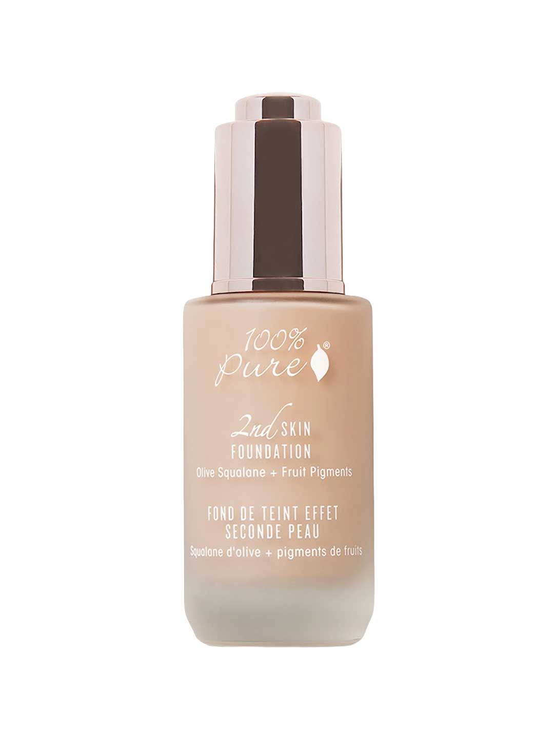 100% Pure 2nd Skin Serum Foundation 35ml by 100% Pure combines olive squalane and fruit pigments for natural coverage. Comes in frosted beige packaging with a gold pump dispenser.