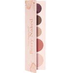 The 100% Pure Fruit Pigmented® Berry Naked Palette 9g by 100% Pure features five vegan eyeshadows in berry, brown, taupe, rose, and light pink shades in a floral-embellished light pink case with gold lettering.