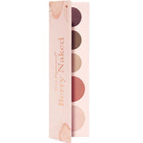 The 100% Pure Berry Naked Palette 9g is a vegan eyeshadow palette with five circular berry and neutral shades in light pink tones, displayed in an open case for long-lasting wear.