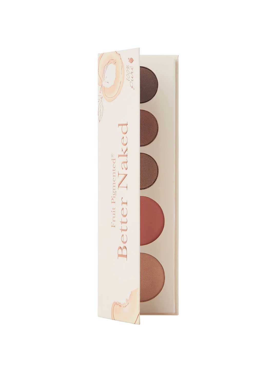 The 100% Pure Better Naked Palette 9g is open, showing five vegan eyeshadow and blush shades in neutral and peach tones. The light, minimal packaging features subtle fruit illustrations and a clean design.
