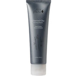 A gray tube labeled 100% Pure Charcoal Clay Cleanser, featuring white text, a bamboo illustration, and a clear cap. This 80ml cleanser by 100% Pure deeply purifies your skin with detoxifying charcoal clay.