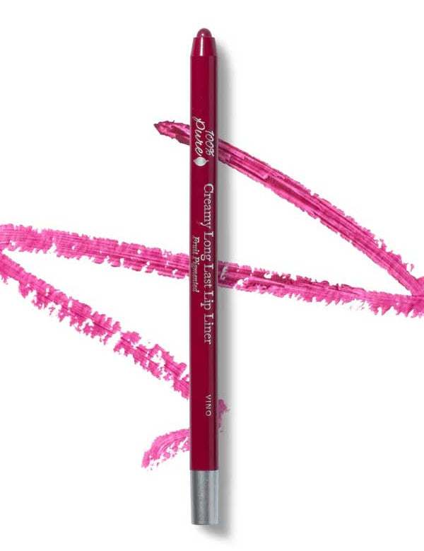 A pink 100% Pure Creamy Long Last Lip Liner 1.14g pencil rests on a white surface, surrounded by vivid pink lip liner swatches.