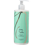 A bottle of 100% Pure Glossy Locks Repair Conditioner with a pump, mint green label featuring abstract black and peach lines, and black text.