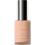 A glass bottle of 100% Pure Healthy Foundation 30ml with a silver cap features white labeling on the front. This vegan, full coverage light beige formula delivers a flawless finish using natural fruit pigments.