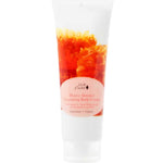 A 236ml tube of 100% Pure Honey Almond Nourishing Body Cream, featuring an orange and yellow design with a pink front label.