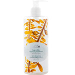 A clear pump bottle of 100% Pure Kelp & Mint Volumising Conditioner for fine hair, with golden-brown kelp art on a crisp white label. Brand: 100% Pure.