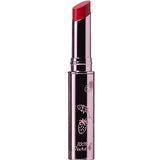 A 2.5g tube of 100% Pure Fruit Pigmented® Lip Glaze stands upright, featuring a metallic case with white strawberry illustrations and "100% Pure" text near the base, set against a white background.