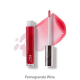 A tube of 100% Pure Fruit Pigmented® Lip Gloss (4.17ml) in red with a wand applicator, some gloss swiped beside it and labeled Pomegranate Wine, is shown on a white background.