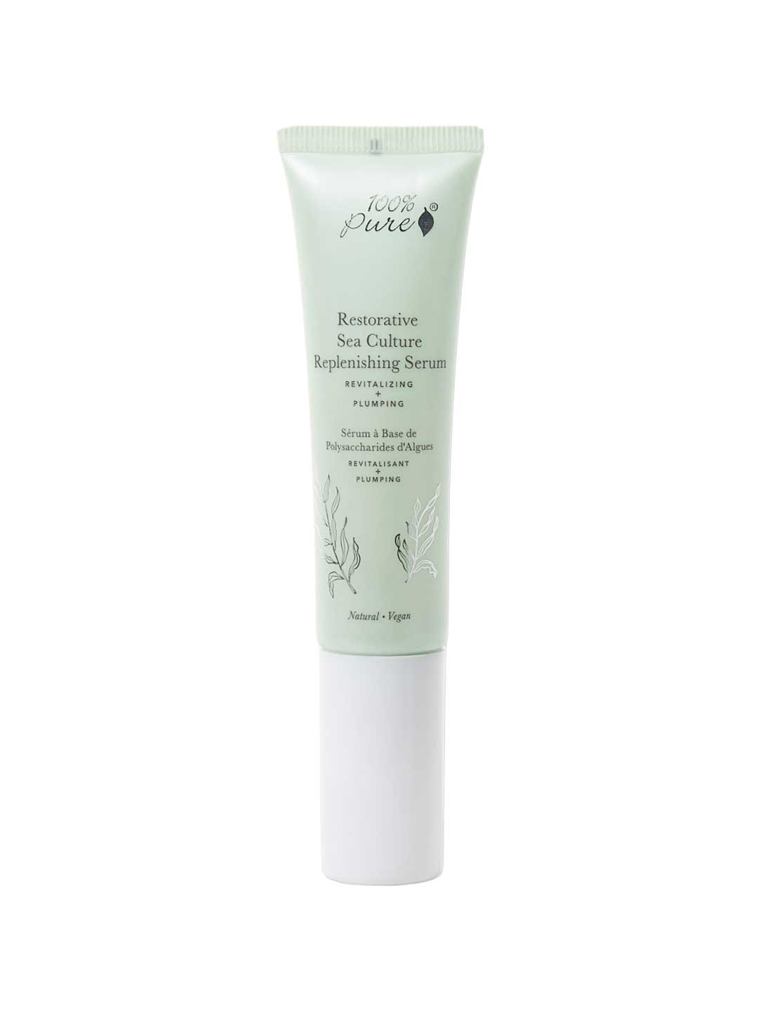The 100% Pure Restorative Sea Culture Replenishing Serum 30ml comes in a light green tube with a white cap and botanical accents; it's a hydrating serum powered by seaweed polysaccharides to replenish your skin’s radiance.
