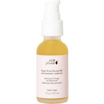 A glass pump bottle with a white label contains 100% Pure Super Fruit Facial Oil 29.5ml—an all-natural, vegan formula rich in antioxidants and pomegranate seed oil.