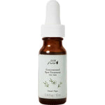 A small brown glass dropper bottle labeled 100% Pure Tea Tree Concentrated Spot Treatment 10ml with a white cap and floral design. This natural, vegan formula is ideal for blemish-prone skin and contains 0.34 fl oz (10 ml).
