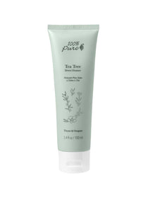 A light green tube of 100% Pure Tea Tree Detox Cleanser 100ml, ideal as a tea tree oil face wash for acne-prone skin with thyme and oregano, features minimal floral designs and a white cap.