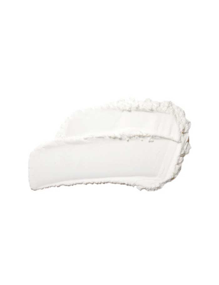 Two overlapping strokes of thick, white cream or lotion appear on a plain white background, evoking the smooth finish of the 100% Pure Translucent Bamboo Blur Powder 5.5g.