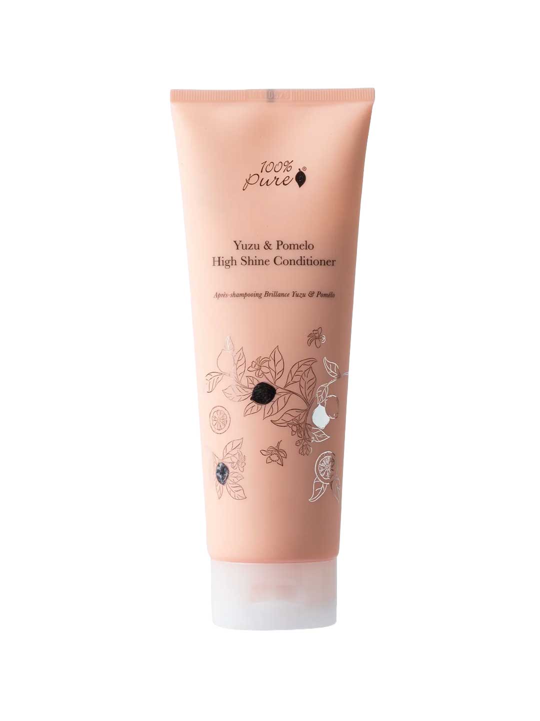 A peach-colored tube of 100% Pure Yuzu & Pomelo High Shine Conditioner, a sulfate-free conditioner featuring black text and botanical illustrations on the front.