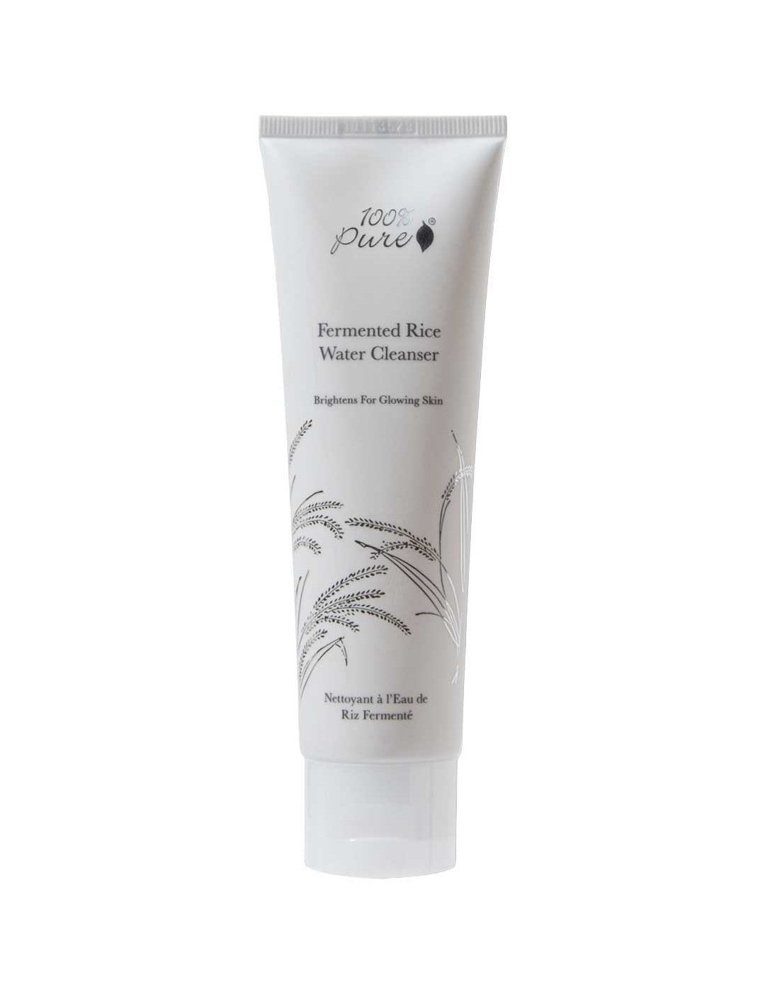 A white tube of 100% Pure Fermented Rice Water Cleanser 100ml, featuring minimalist black text and a rice stalk illustration, stands upright on a white background—ideal for brightening and targeting hyperpigmentation.
