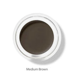 A top view of the 100% Pure Long Last Brows 4.5g by 100% Pure, a small round container filled with medium brown natural brow gel, labeled "Medium Brown" on a white background.