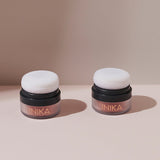 Lifestyle photo of INIKA Organic Mineral Blush Puff Pot in Rosy Glow