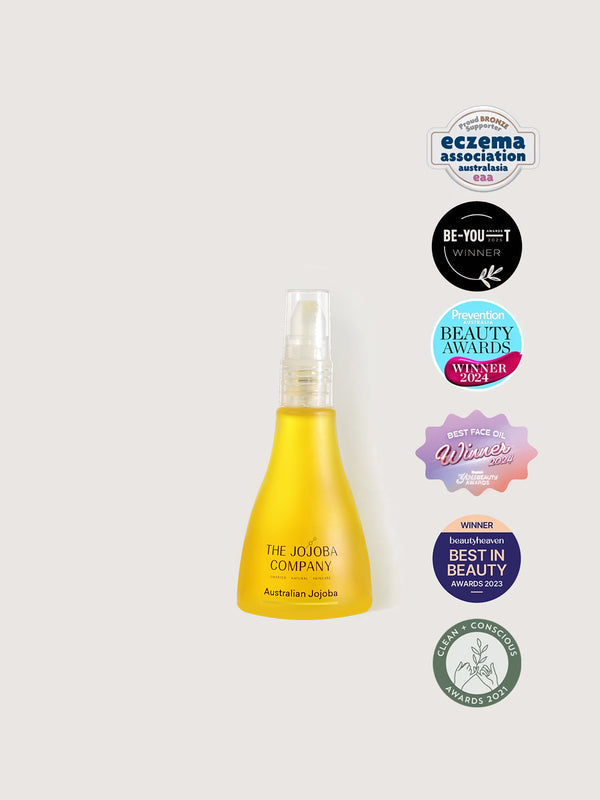 The Jojoba Company Australian Jojoba 30ml yellow spray bottle on a white background
