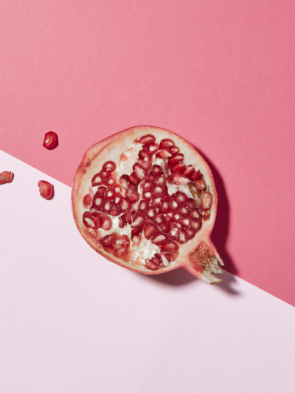 Andalou 1000 Roses Complex Colour Care Shampoo styled with pomegranate