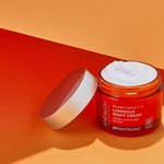 Andalou Brightening Purple Carrot + Vitamin C Luminous Night Cream styled product shot