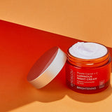 Andalou Brightening Purple Carrot + Vitamin C Luminous Night Cream styled product shot