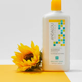 Andalou Naturals Brilliant Shine Sunflower & Citrus Shampoo styled with sunflower
