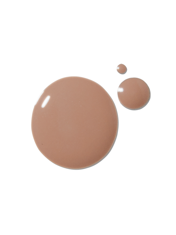A medium-brown 100% Pure 2nd Skin Serum Foundation swatch forms one large glossy circle beside two smaller round drops on white.