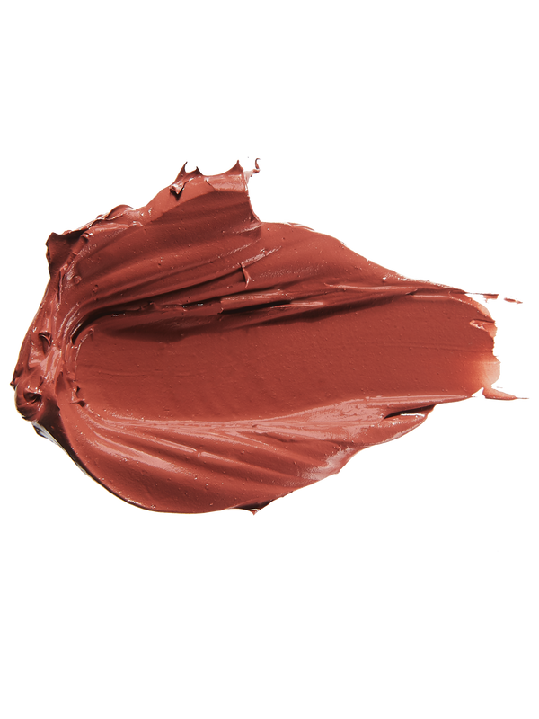 A thick smear of rust brown Cacti matte lipstick on white, with a smooth centre and raised, creamy ridges around the edges.
