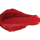 A thick smear of rich cherry red Nopal matte lipstick on white, with a smooth centre and raised, creamy ridges around the edges.
